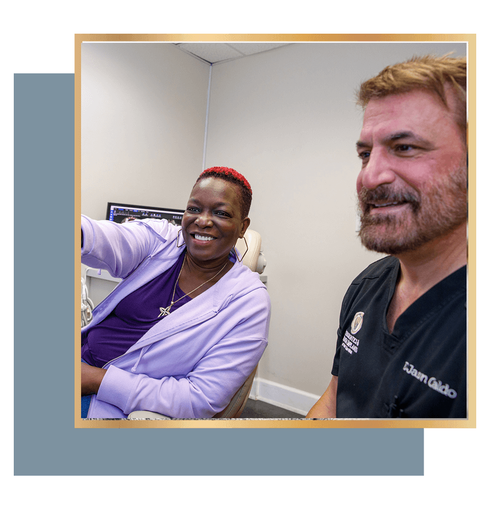 patient and doctor going over dental procedure information